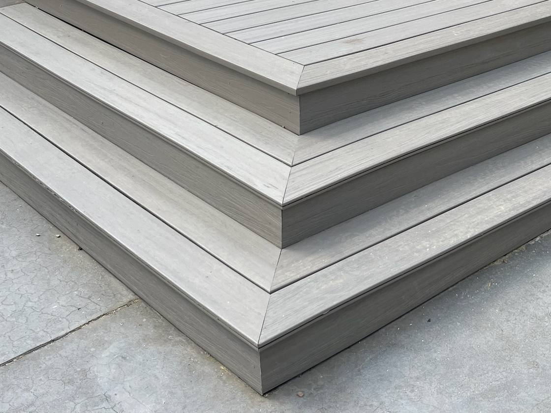 Close-up of the mitered corners on wrapped composite deck stairs